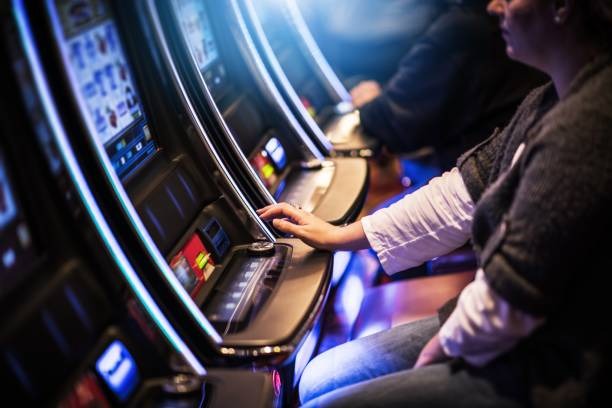 Book of Dead slot game interface on budew platform displaying reels and payout table